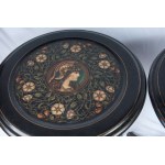 Pair of sailing gueridons early 20th century 72 x 46 cm round top with effigy of male and female warriors, spindle-shaped shaft with central ring tapered towards the bottom, ending with three comma-shaped support feet. In black monochrome, the surfaces of