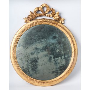 round wall mirror 20th century diameter 47 cm; with top 53 cm in gilded wood carved with palmette motifs along the upper edge and a bow-shaped top with flowers. State of preservation: good with wear to the gilding as per use over time, round wall mirror 2