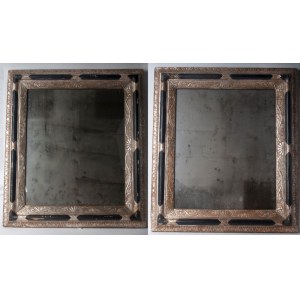 Pair of mirrors 20th century 64 x 73 cm in wood engraved with palmettes and roicailles in black lacquer and silver. State of conservation: small defects in the silver plating and wear as per use over time, Pair of mirrors 20th century 64 x 73 cm in wood e
