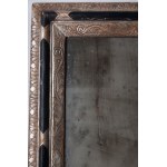 Pair of mirrors 20th century 64 x 73 cm in wood engraved with palmettes and roicailles in black lacquer and silver. State of conservation: small defects in the silver plating and wear as per use over time, Pair of mirrors 20th century 64 x 73 cm in wood e
