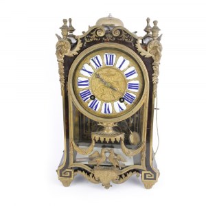 Table clock 18th century 35 x 22 x 12 cm with circular dial in gilded bronze and engraved with floral reliefs, with Roman numerals in blue on white enamel and Arabic numerals on the outer edge, it has two holes for winding and striking. Movement with wire