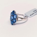 Silver ring with natural topazes