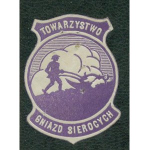 1 Znaczek kwestarski Towarzystwo Gniazd Sierocych, granatowy, tłoczony.