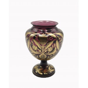 Vaso con fiori dorati