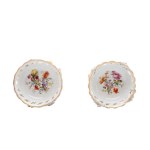 A PAIR OF PORCELAIN CHAIRS WITH A PUTTI MOTIF | SCHIERHOLZ, PLAUE (GERMANY / GERMAN)