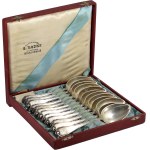 20th century, Warsaw, Gustaw Radke, set of 12 silver dinner spoons in a wooden box