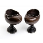 A pair of ornamental cups with coco de mer