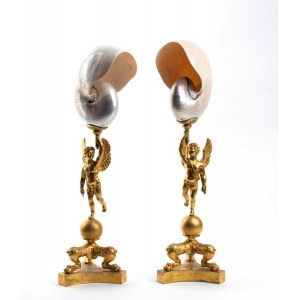 A pair of nautilus shells mounted on bronze bases