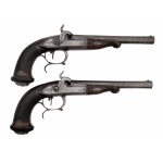Pár perkusních pistolí v kazetě