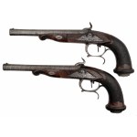 Pár perkusních pistolí v kazetě