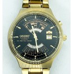 Vintage pánev Orient, automatická, černá a zlatá.