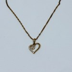 375/9K gold heart necklace with Zircons.
