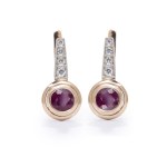 Earrings with rubies and diamonds, early 21st century.