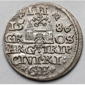 Stefan Batory, Trojak Ryga 1586 - duża głowa, lilijki