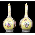 A pair of porcelain lidded vases