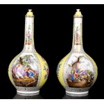 A pair of porcelain lidded vases