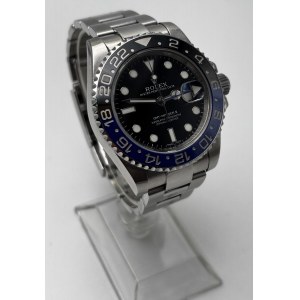 ROLEX GMT MASTER II. Referenční číslo 116710BLNR. Alfanumerický sériový kód...