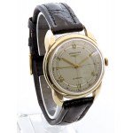 LONGINES. Self-winding movement. 14 kt gold case,...