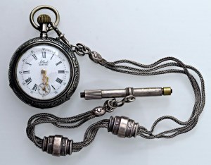 Women's pocket watch, double case in silver-plated metal...
