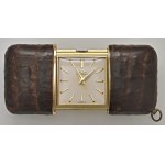 MOVADO extensible gold-plated brass clock, covered in p...