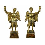 Pair of torchbearer angels in carved and gilded wood, central Italy, 17th century