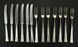 Set of knives and forks with the coat of arms of Prussia. Total 13 pieces. (112)