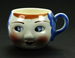 Head-shaped mug, Chodzież, 1930s. Blue (418)