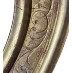 Carved and gilded wooden frame, oval-shaped