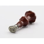 Stamp piston with WP monogram