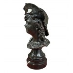 bust of a woman with a hat