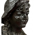 bust of a woman with a hat