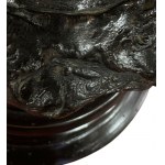 bust of a woman with a hat
