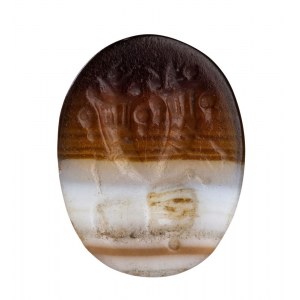 An Italic banded agate intaglio. Hand holding two cornucopias.