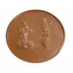 A Roman agate intaglio. Canopus vase with a bust of Horus.