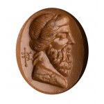 A Roman carnelian intaglio. Bust of an herm.
