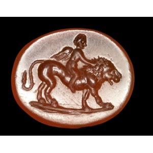 A Roman carnelian intaglio. Eros on a lion.