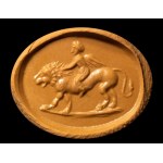A Roman carnelian intaglio. Eros on a lion.