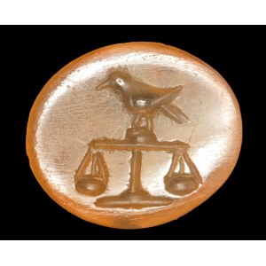 A Roman carnelian intaglio. Bird on a scale.