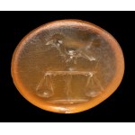 A Roman carnelian intaglio. Bird on a scale.