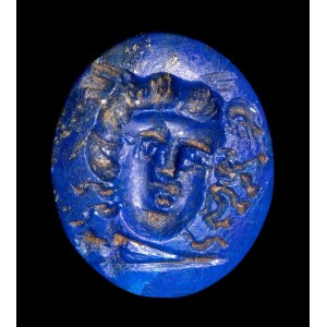 A roman lapis lazuli magical intaglio. Gorgona mask with torch
