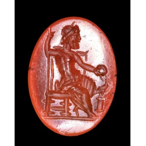 A Roman carnelian intaglio. Seated Zeus.