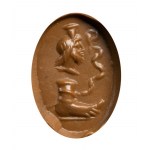 A Roman magical carnelian intaglio. Serapis with foot and snake.