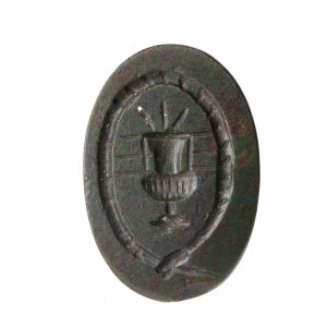 A Roman magical double sided bloodstone intaglio. A vase into an ouroboros with inscriptions.