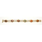 A Roman gold bracelet with six hardstones intaglios. Various subjects.