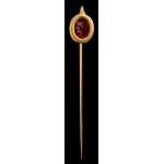 A Roman carnelian intaglio set in a gold stick pin. Apollo.