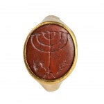 A Roman gold ring with a jasper intaglio. Menorah with attributes.
