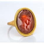 A fine Roman carnelian intaglio set in a modern gold ring. Portrait of the empress Sabina.