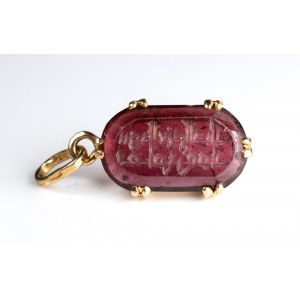 The Seal of the Emir 'Ammar. Tourmaline intaglio with Arabic inscription, set in a later gold pendant