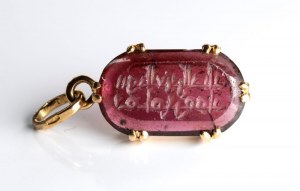 The Seal of the Emir 'Ammar. Tourmaline intaglio with Arabic inscription, set in a later gold pendant