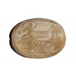 A postclassical Near Eastern agate engraved scarab. Victory on a biga.